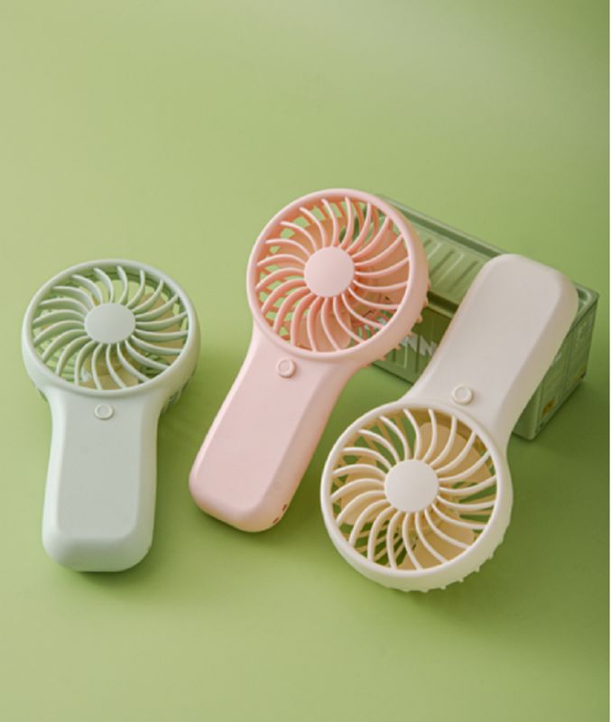 Ventilador portátil de batería AA de mano de 2W de potencia 3V de voltaje Modo de velocidad única Incluye cordón blanco verde rosa